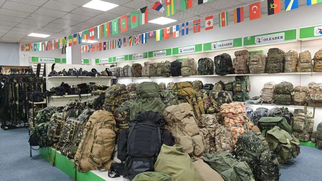 Industrial sewing and assembly line producing tactical vests and duty belts for export